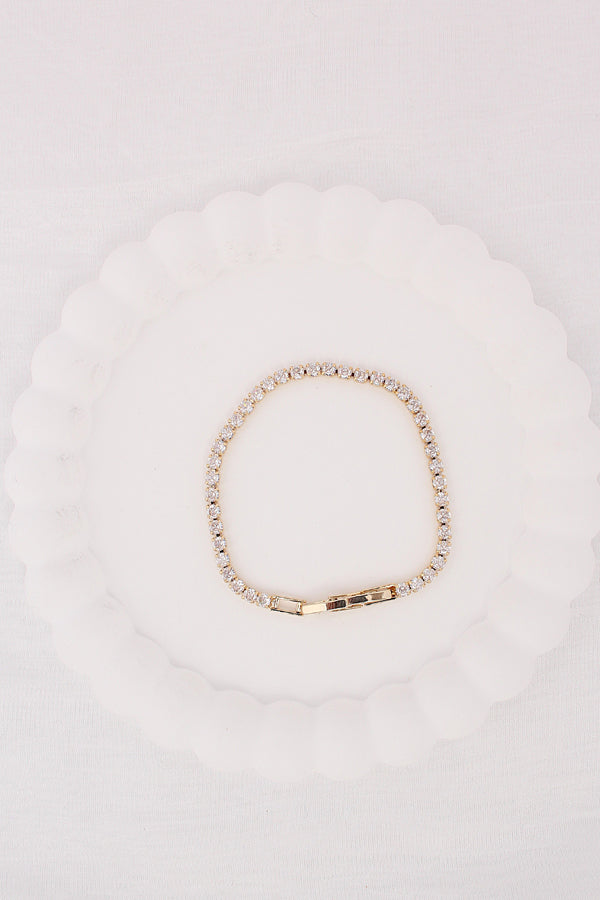 Narrow And Sleek Elegant Tennis Bracelet With Stones In Gold Polish (BR029-G)
