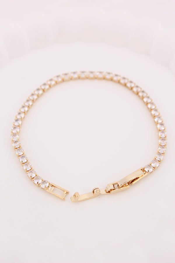 Narrow And Sleek Elegant Tennis Bracelet With Stones In Gold Polish (BR029-G)