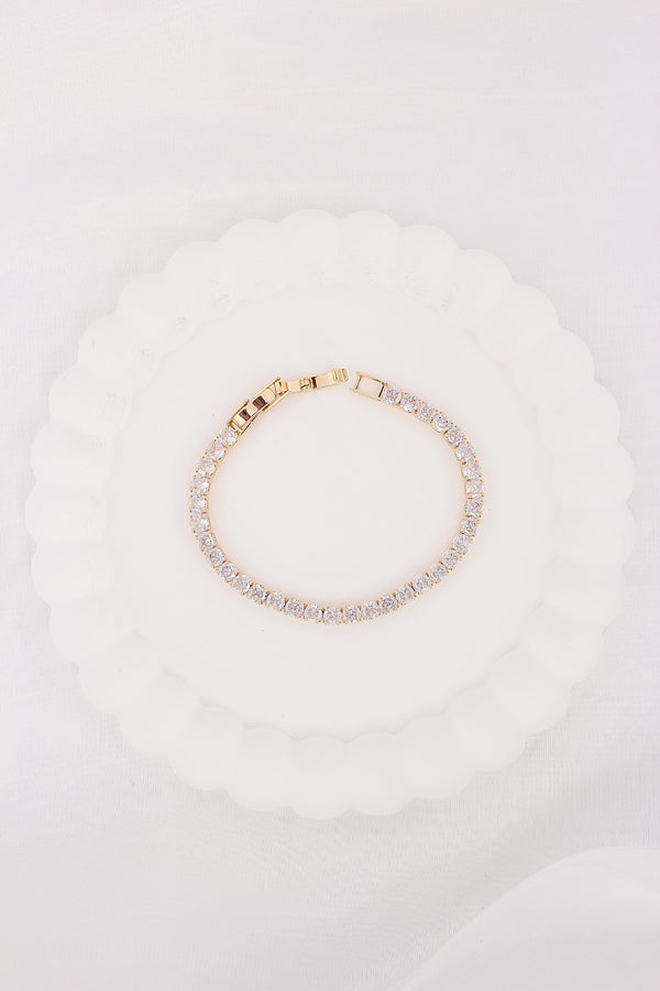 Sleek Tennis Bracelet Design In Gold Polish And Stones (BR028)