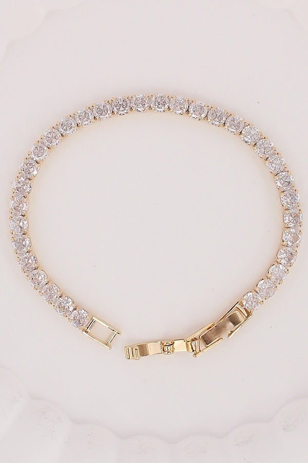Sleek Tennis Bracelet Design In Gold Polish And Stones (BR028)