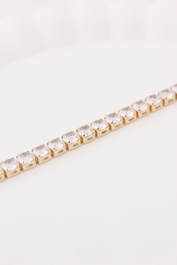 Sleek Tennis Bracelet Design In Gold Polish And Stones (BR028)