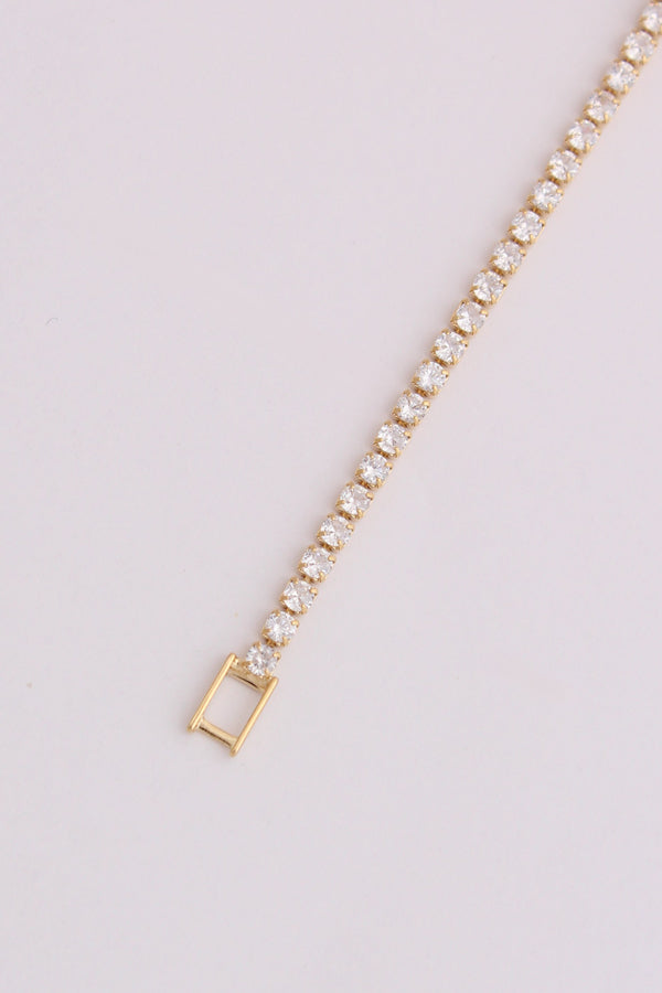 Sleek Tennis Bracelet Design In Gold Polish And Stones (BR028)