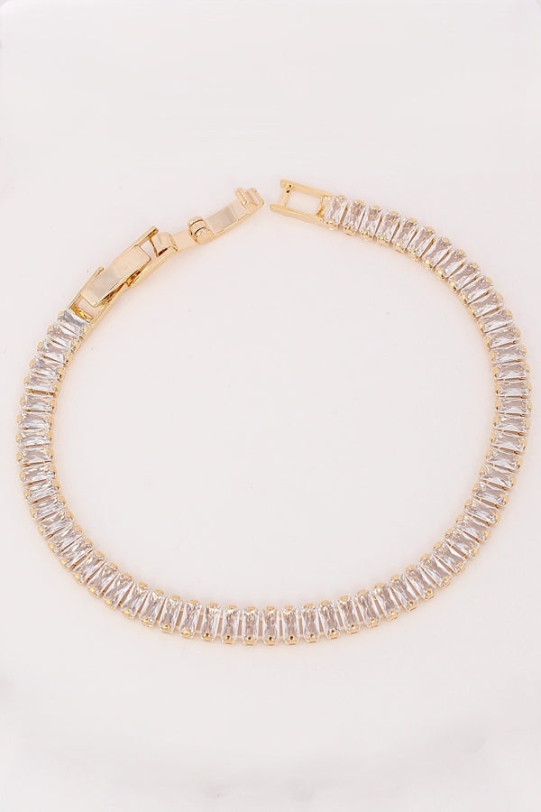 Tennis Bracelet With Oblong Stones In Gold Polish (BR018)