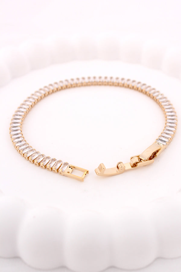 Tennis Bracelet With Oblong Stones In Gold Polish (BR018)