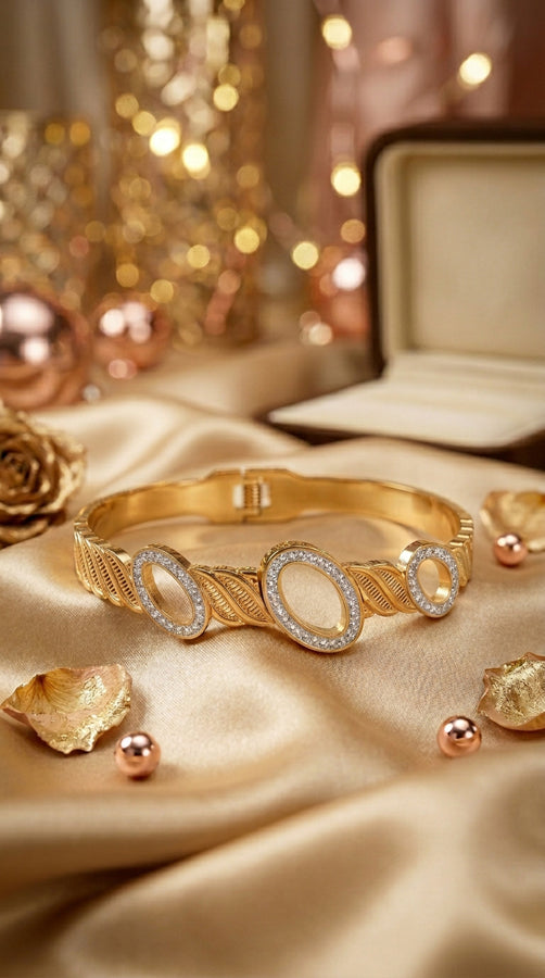 Center Flower Design Bangle In Gold Stainless Steel (ESBA052)